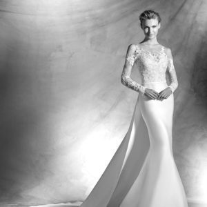 Pronovias Atelier Vitorial Wedding Dress Sample Sale - Fit and flare style dress in silk mikado with chantilly lace, long sleeves, cutout shoulder, and detachable train