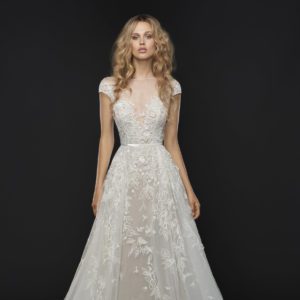 Hayley Paige Vaughn 6757 Wedding Dress Sample Sale - A Line dress with illusion bateau neckline, cap sleeve, low open back, belt detail and floral full skirt.