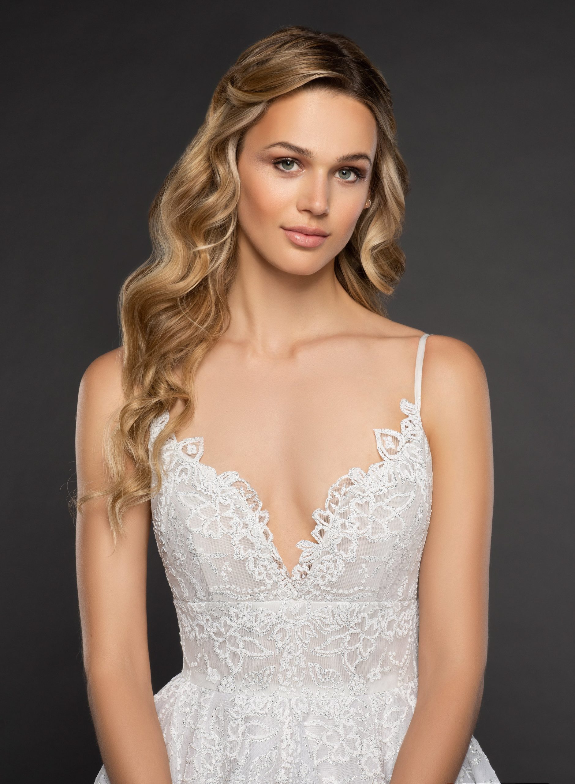 Hayley Paige Markle 6850 Wedding Dress Sample Sale - Labyrinth caviar Ballgown style dress with scalloped v-neckline, floral lace, spaghetti straps, illusion net side cut out, and detail skirt. Full cascading caviar and tulle skirt with cashmere lining.