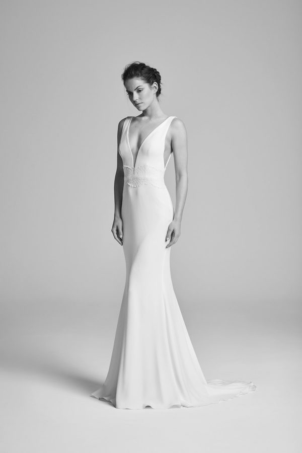 Suzanne Neville Pandora Wedding Dress Sample Sale - Beautiful fit and flare style with fitted crepe fabric, deep v-neckline and lace detail around waist.