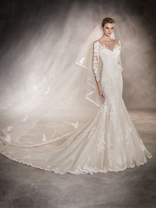 Pronovias Tibet Wedding Dress Sample Sale - Mermaid dress with allover lace, 3/4 sleeves gorgeous floral lace, Modified sweetheart neckline, and illusion v neck.