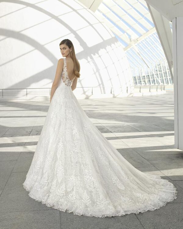 Rosa Clara Collection Demet Wedding Dress - A-line skirt with textured appliqués, low front and back necklines and details on the shoulder straps.