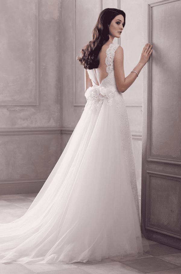 Paloma Blanca 4402T Wedding Dress Sample Sale - A Line style dress in lace bodice with Detachable tulle train and 3D floral detail, open back and straps. 