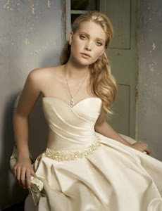Alvina Valenta 9902 Wedding Dress Sample Sale - Creme silk duchess satin A-line dress with strapless sweetheart neckline with an asymmetrical pleated bodice.