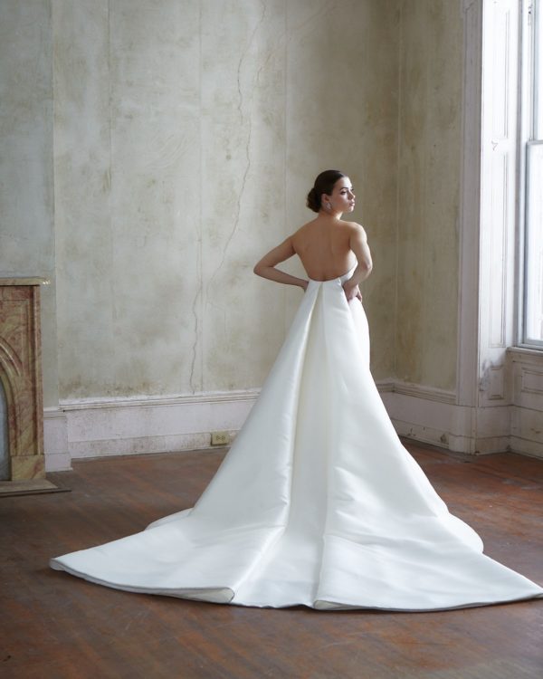 Allison Webb Beckwith Wedding Dress - Blended dupioni fit and flare gown, with a crescent neckline and a detachable watteau train.