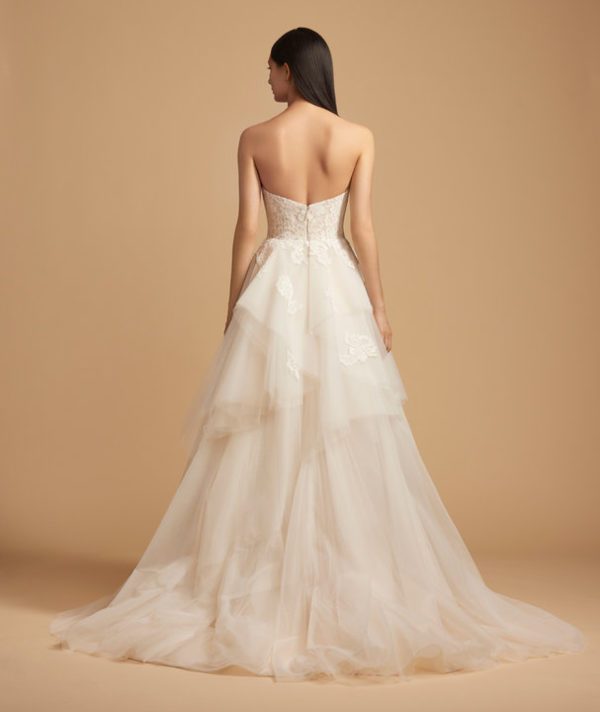 Allison Webb Camilla Wedding Dress - Strapless sweetheart corset bodice, net ball gown in Ivory lace over Cashmere lining, a tiered skirt and chapel train.