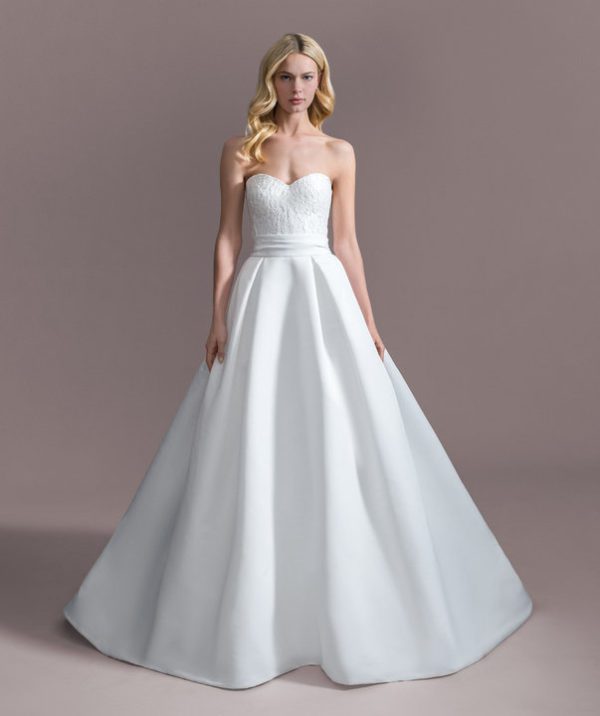 Allison Webb Eden Wedding Dress - Snow blended faille ballgown with box pleats, French lace corset bodice, sweetheart neckline, bow and chapel train.