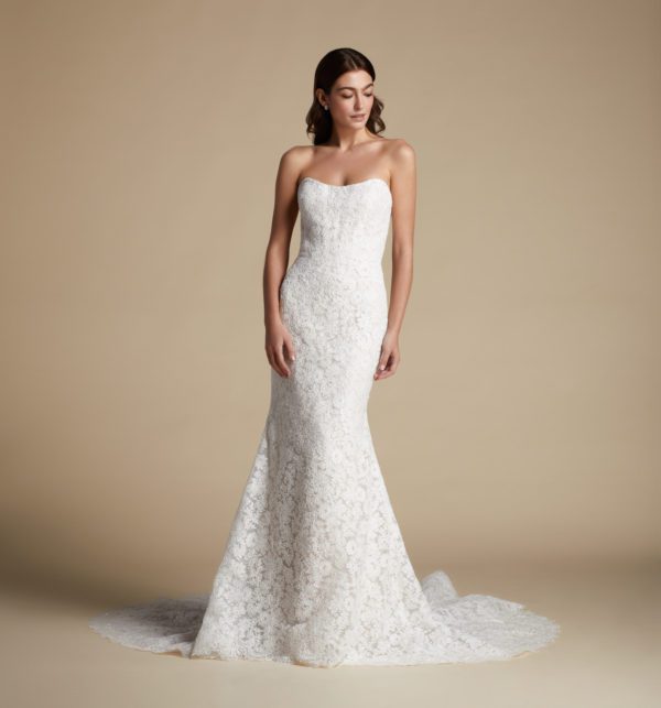 Allison Webb Laurel Wedding Dress - Fit and flare beaded Alencon lace gown, with a strapless curved neckline and buttons to the end of the train.