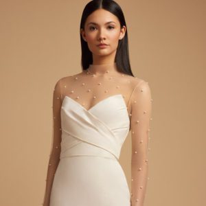 Allison Webb Meredith Wedding Dress - Ivory Silk faille strapless fit and flare gown with a draped bodice and origami half bow detail.
