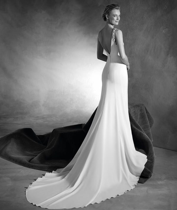 Pronovias Nelly Wedding Dress Sample Sale - Mermaid dress in crepe with delicate drop waist & bateau neckline, low v-back, beaded details and train.