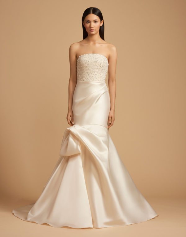Allison Webb Penelope Wedding Dress - Ivory mikado asymmetrically draped fit to flare gown, with pearl crystal encrusted bodice with crescent neckline.