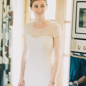Suzanne Neville Tourmeline Wedding Dress Sample Sale - A Line stretch crepe dress with sweetheart neckline, lace illusion high neck and cap sleeves.