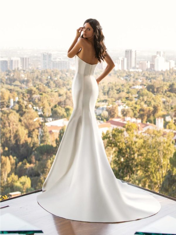 Pronovias Day Wedding Dress - Mermaid gown, tailored in silk mikado with asymmetrical pointed strapless neckline and low back for a modern look.