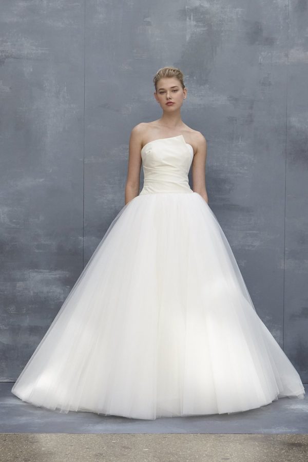 Amsale Aberra Iris Wedding Dress Sample Sale - Classic ball gown combines intricate pleating with layered tulle, asymmetrical envelope neckline and drop waist skirt with V- back.
