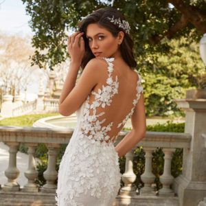 Pronovias Josephine Wedding Dress - Mermaid gown featuring clusters of floral 3D appliqué, deep V neckline and illusion open back.