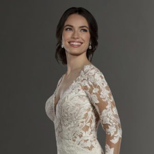 Martina Liana 1180 Wedding Dress - Fit and flare cotton-style lace dress with deep V- neckline, stunning illusion long sleeves and open back with train.