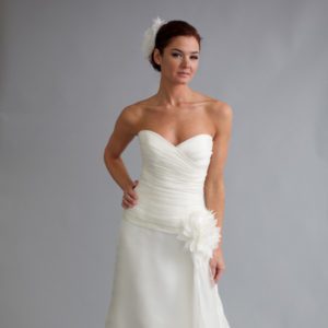 Modern Trousseau Holly Wedding Dress Sample Sale - Strapless sweetheart neckline A-line style dress with multi fold detail on bodice and tulle flower on left hip.