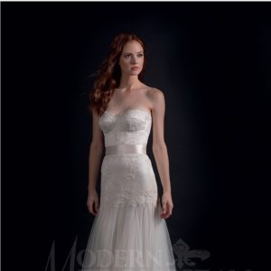 Modern Trousseau Maven Wedding Dress Sample Sale - Fit and flare style dress with corset bodice, flowing tulle skirt and delicate French lace.