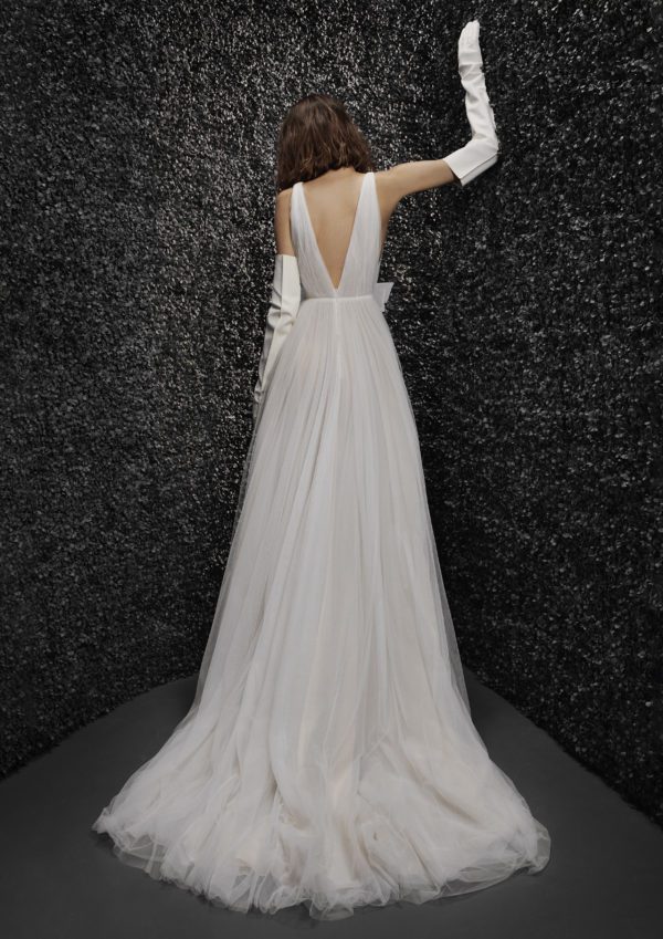 Vera Wang x Pronovias Noelle Wedding Dress - Light nude, soft tulle and organza A Line style dress with v-neckline, deep v-back and bow detail on waist.