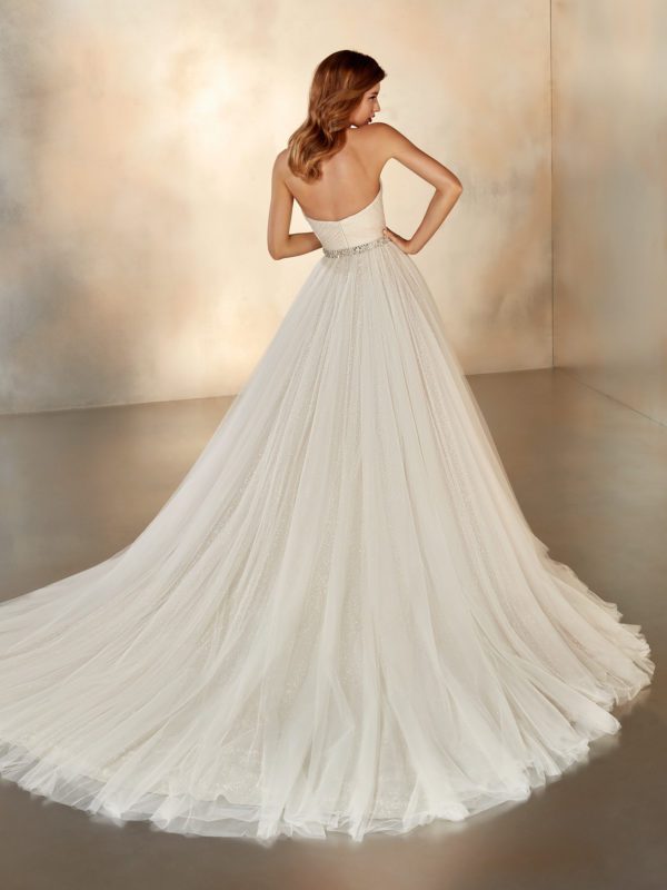 Pronovias Atelier Nigh Wedding Dress - Strapless ballgown with sparkling fabric, deep plunge sweetheart neckline, belt detail and train.