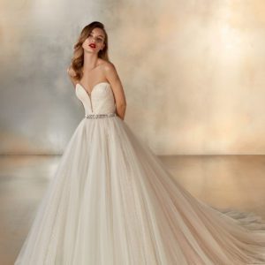 Pronovias Atelier Nigh Wedding Dress - Strapless ballgown with sparkling fabric, deep plunge sweetheart neckline, belt detail and train.