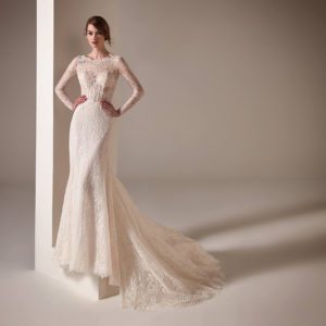 Pronovias Malala wedding dress - Fit and flare dress with lace, scalloped neckline, corset bodice and skirt dotted with sparkling, white sequins.