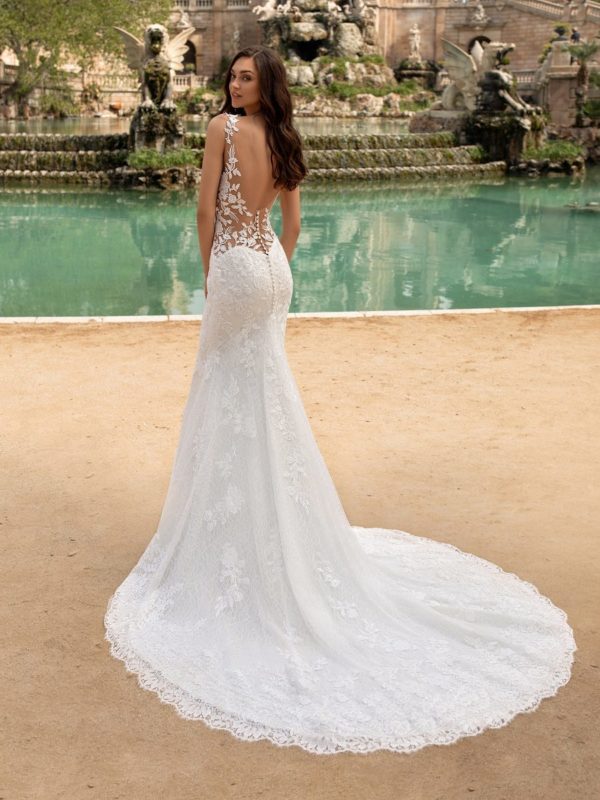 Pronovias Morocco Wedding Dress Sample Sale - Mermaid silhouette dress with illusion paneling, embroidery over lace, v-neckline, low open back and train.