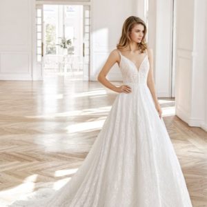 Rosa Clara Aire Niord Wedding Dress - Ball gown style tulle dress with delicate skinny straps over shoulder, v-neckline in a lace with elegant beading.