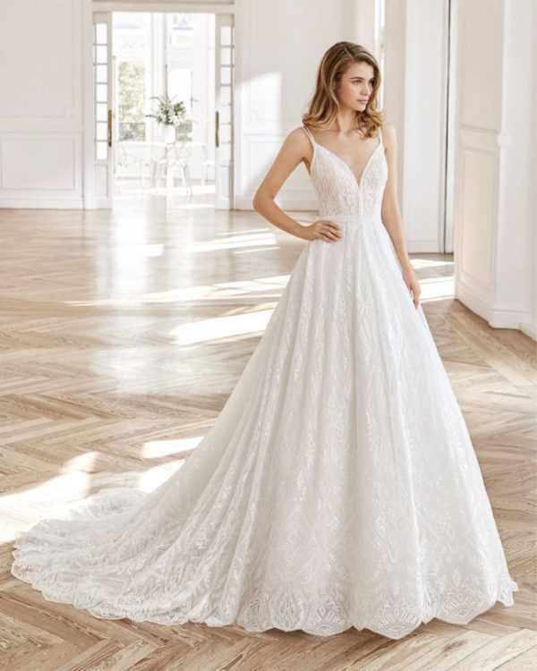 Rosa Clara Aire Niord Wedding Dress - Ball gown style tulle dress with delicate skinny straps over shoulder, v-neckline in a lace with elegant beading.