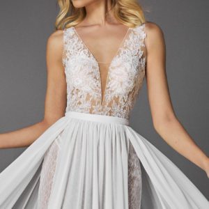 Pronovias Sapna Bodice Wedding Dress - Illusion top with delicate beaded transparent lining and lace along deep v plunge neckline.