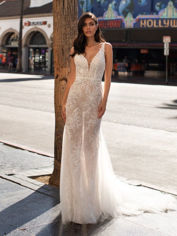 Pronovias Mansfield Wedding Dress Sample Sale - Sheath dress with tulle and semi-transparent lace featuring a plunge v-neckline and open back.