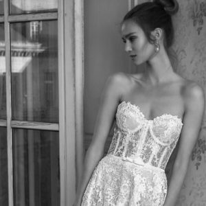 Netta BenShabu Symon Wedding Dress - Strapless sweetheart neckline A-line gown with a sheer bustier style bodice, delicate lace and light beading.