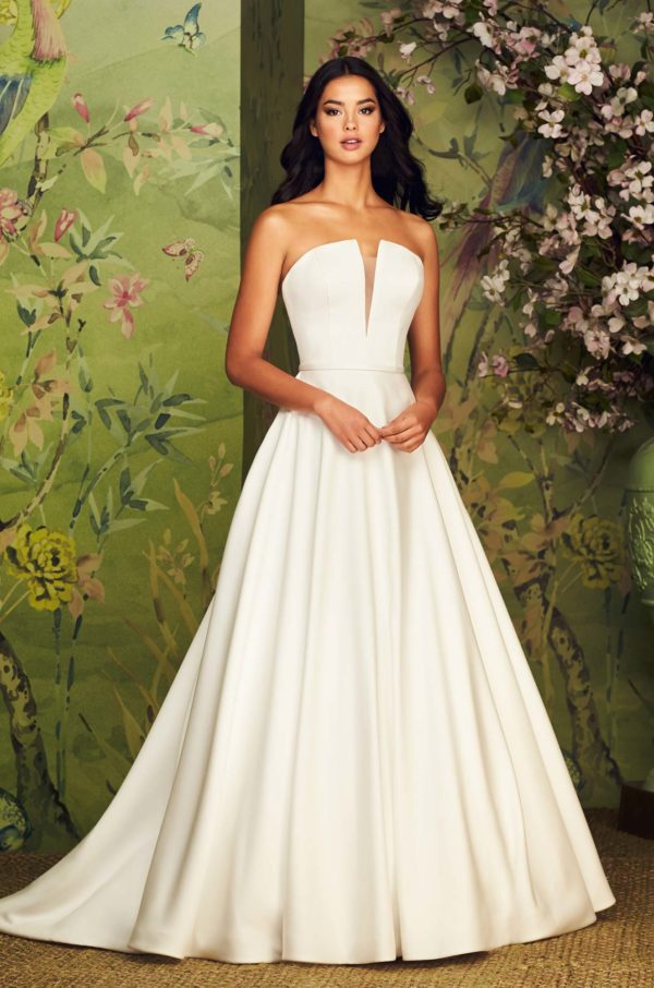 Paloma Blanca 4888 Wedding Dress - A Line strapless Satin dress with plunging notched neckline and full circle skirt with pockets and silk Ribbon detail.