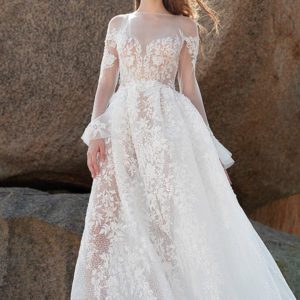 LaPremiere x Inbal Dror Christi Wedding Dress – Long sleeve lace A-line dress, low open back and illusion nude bodice with sweetheart neckline.