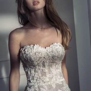 Netta BenShabu Charlie Wedding Dress - Fit and flare style dress with sweetheart neckline, low back, beaded floral appliqués layered over glitter tulle.