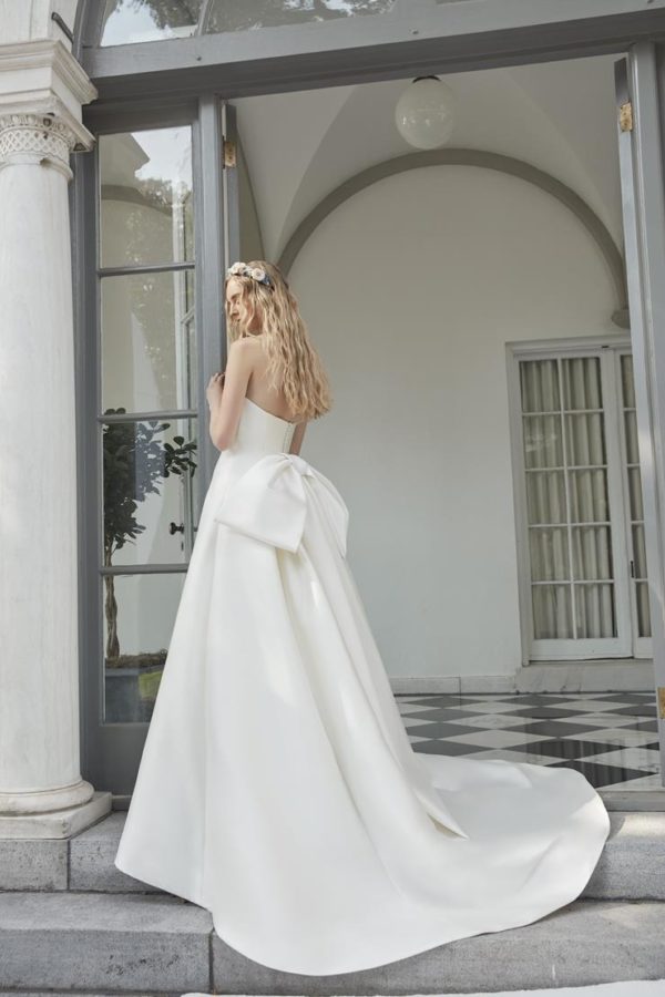 Sareh Nouri Narcissus Wedding Dress - Modified A Line style dress with Italian Stretch fabric, strapless neckline and signature bow.