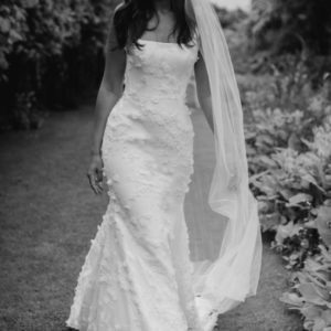 Suzanne Neville Gigi Wedding Dress - Fit and flare gown with Italian crepe, 3D embroidered flowers, with square neckline and back.