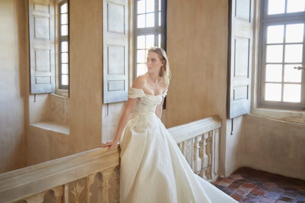 Peter Langner Novara Wedding Dress - Ballgown dress in jacquard with an off the shoulder neckline, fitted bodice, draped bust detail and train.