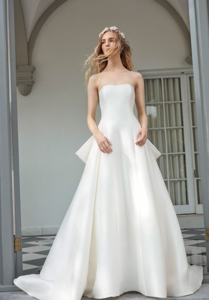 Sareh Nouri Narcissus Wedding Dress - Modified A Line style dress with Italian Stretch fabric, strapless neckline and signature bow.