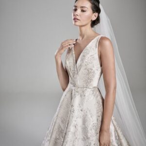 Suzanne NevillePhoenix Wedding Dress - Ballgown with deep v- neckline and deep v- back in plain ducheline fabric, draped on bust and belt detail.