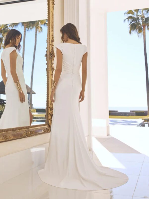 Pronovias Asteria Wedding Dress - A Line chic dress crafted in sustainable eco crepe, with draping bodice, V neckline, cap sleeves and front slit.