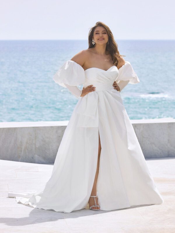 Pronovias Sonia Wedding Dress - A Line sweetheart neckline dress, draped fitted bodice, front slit, bow detail, detachable off the shoulder sleeves.