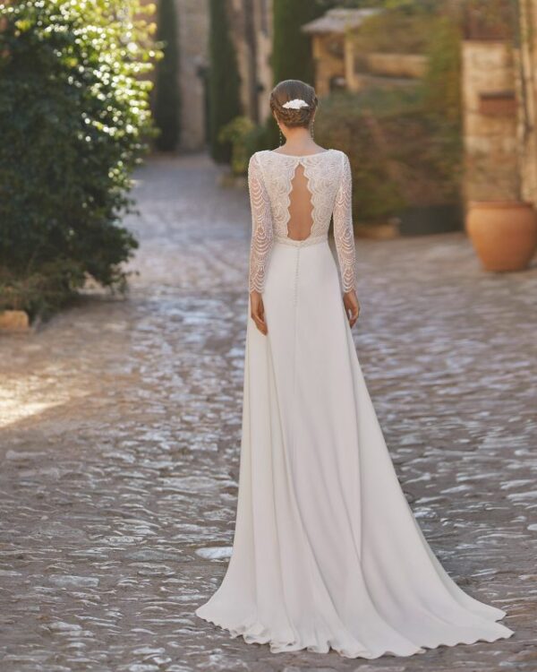 Rosa Clara Boho Usam Wedding Dress - A-line silhouette with long sleeves, plunging V-neckline, open back, lace bodice, crepe skirt and long train.