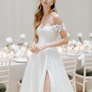 Suzanne Neville Thalasso Wedding Dress - Delicate A Line dress with a layer of hand cut floral 3D appliqué, a sweetheart neckline and a silk organza train.