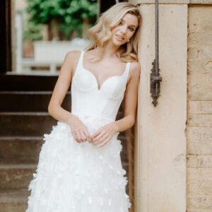 Suzanne Neville Montage Wedding Dress - Sophisticated, timeless wedding dress with iconic tailoring, V-neckline and straps.
