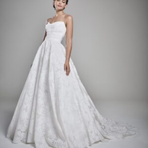 Suzanne Neville Paige Wedding Dress - Ball gown style dress with a sweetheart neckline, fitted draped bodice and small train. 