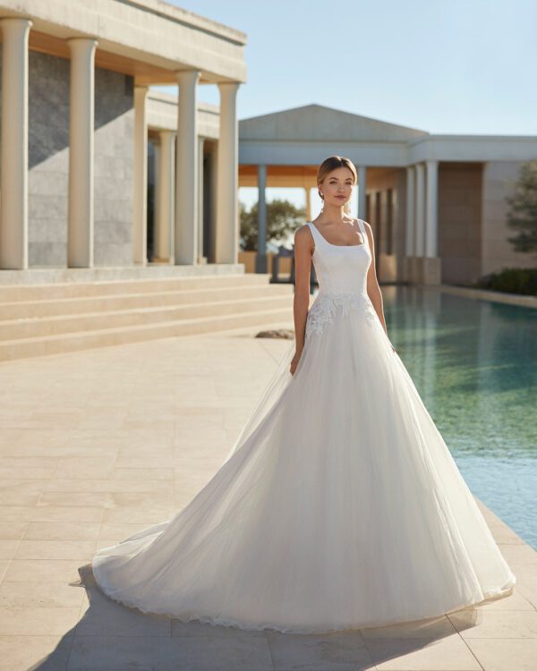 Rosa Clara Collection Vincetta Wedding Dress - A-Line Princess silhouette with square neckline, open back, full skirt, lace around the hip and straps.