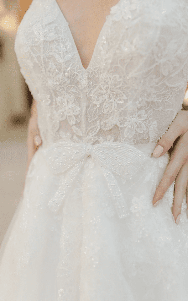 Martina Liana 1477 Wedding Dress Sample Sale - A Line with beaded spaghetti straps, v-neckline, open back, detachable glittering satin belt and tulle skirt. 