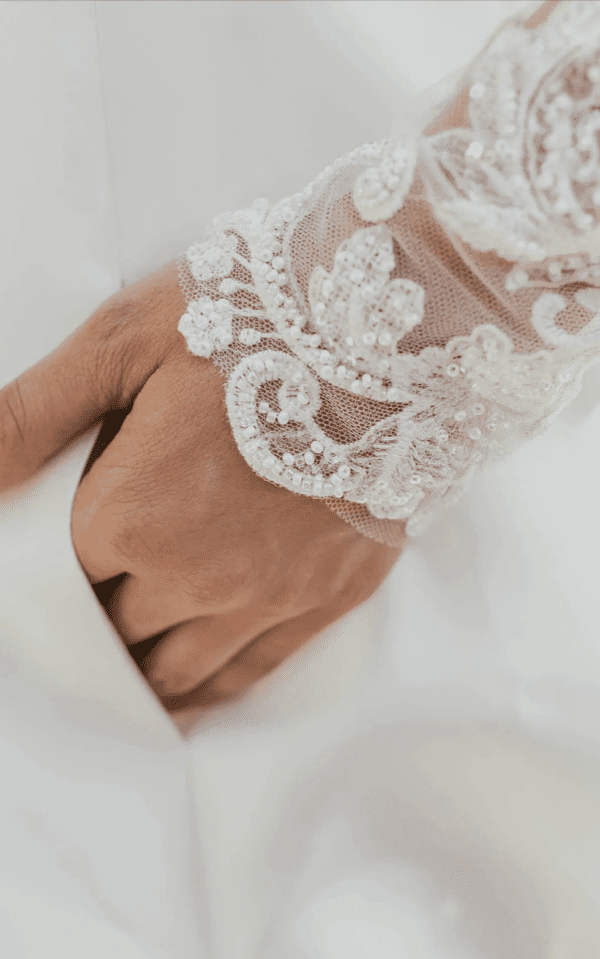 Martina Liana Hannah Wedding Jacket - Detachable illusion tulle jacket in, lace, sheer keyhole back and exposed boning highlights the sleek silhouette.