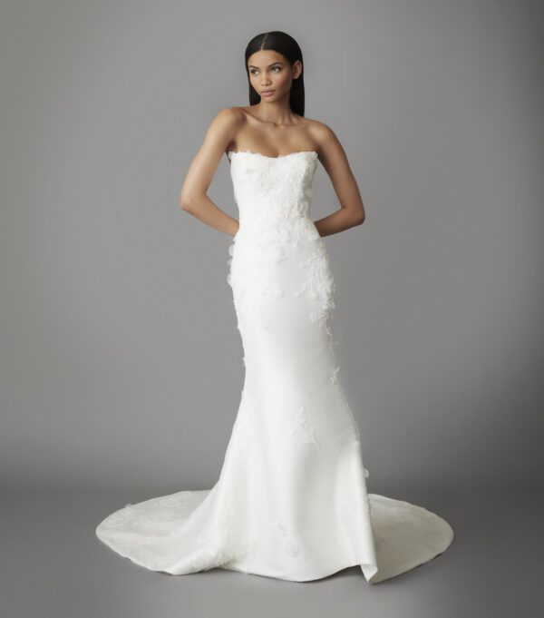 Allison Webb Wedding Dress - Ivory Mikado trumpet-style gown with organically placed beaded, 3D floral lace, natural waist and curved strapless neckline.